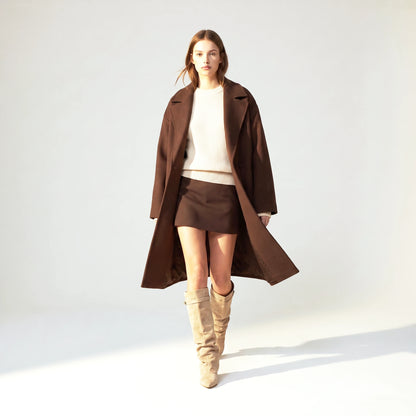 Woman walking in the beige Ravello knee boots, suede shaft in motion