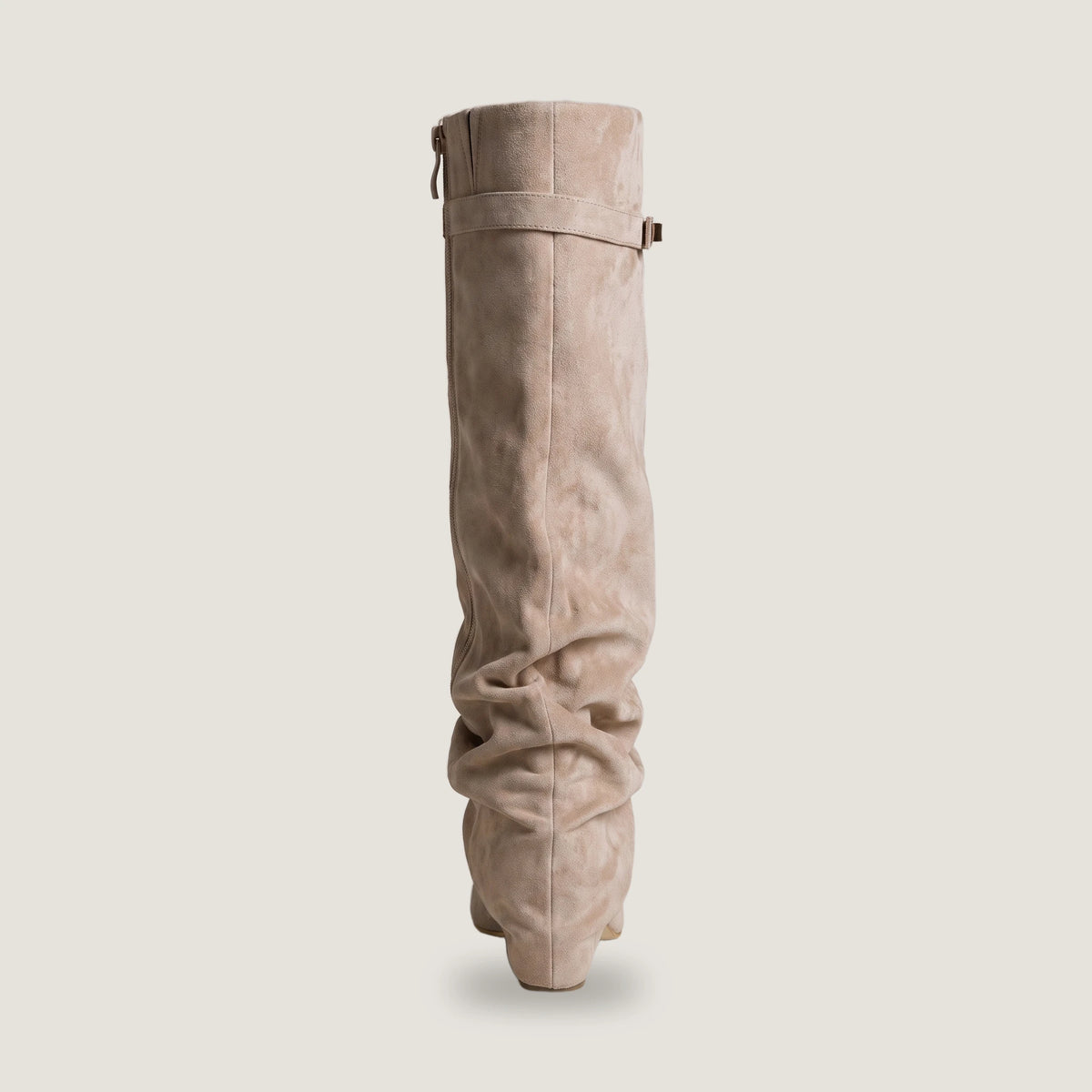 Back view of the beige Ravello knee boot showing the full length zip